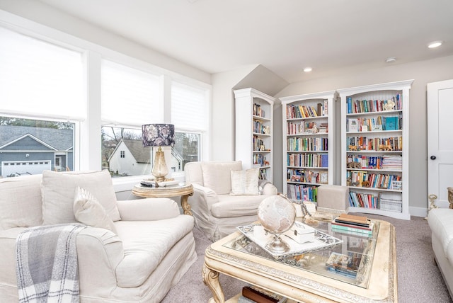 carpeted living room with recessed lighting