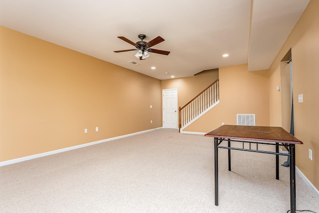 unfurnished office with recessed lighting, light colored carpet, visible vents, a ceiling fan, and baseboards