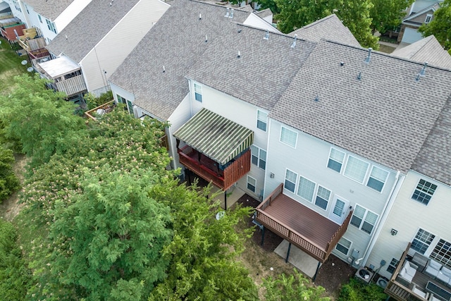 birds eye view of property with a residential view