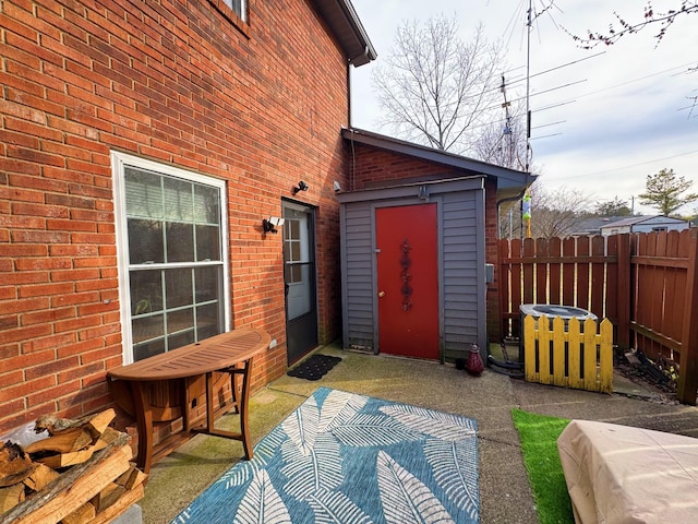 view of patio / terrace featuring fence