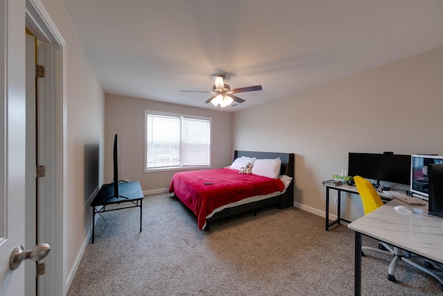 bedroom with carpet floors, ceiling fan, and baseboards