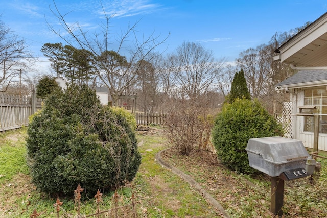 view of yard featuring fence