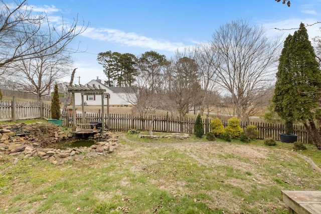 view of yard featuring fence