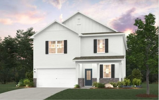 view of front of home featuring a garage, concrete driveway, board and batten siding, and a front yard