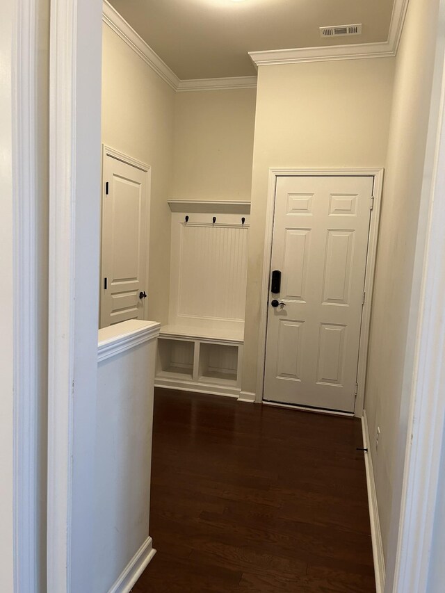 1012 Wooden Gate Dr, Franklin, TN 37064 - mudroom featuring dark wood-type flooring, crown molding, and baseboards