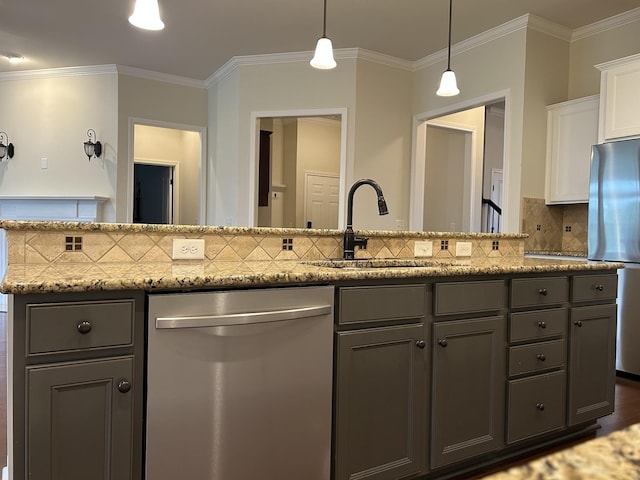 1012 Wooden Gate Dr, Franklin, TN 37064 - kitchen with stainless steel appliances, a sink, gray cabinetry, tasteful backsplash, and white cabinetry