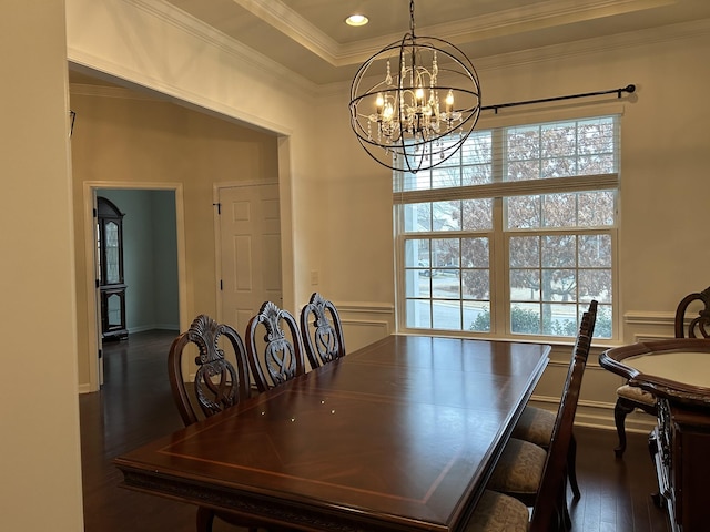 1012 Wooden Gate Dr, Franklin, TN 37064 - dining space featuring a chandelier, ornamental molding, dark wood-type flooring, and wainscoting