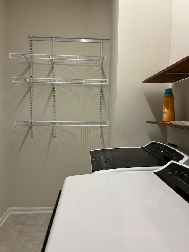 1012 Wooden Gate Dr, Franklin, TN 37064 - laundry room with separate washer and dryer and baseboards