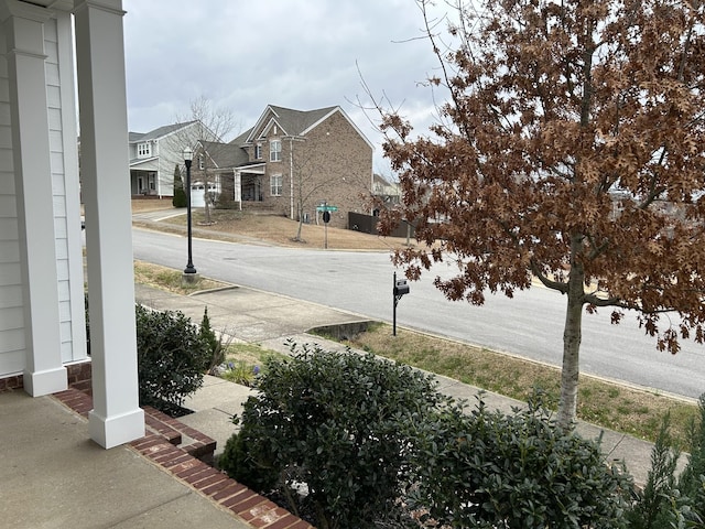 1012 Wooden Gate Dr, Franklin, TN 37064 - view of asphalt street with street lights and sidewalks