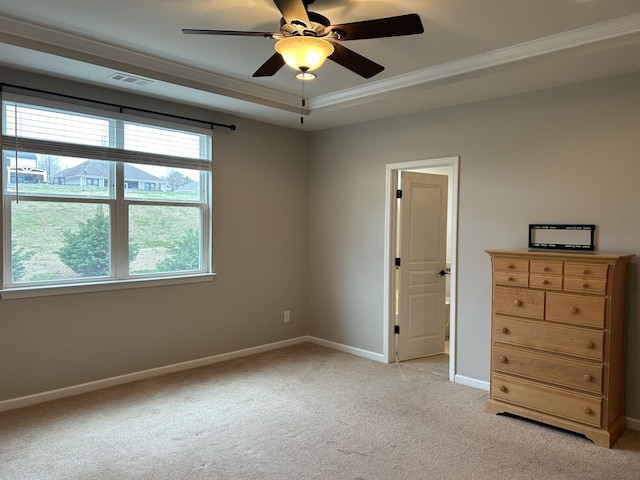 1012 Wooden Gate Dr, Franklin, TN 37064 - unfurnished bedroom featuring light carpet, crown molding, baseboards, a raised ceiling, and a ceiling fan