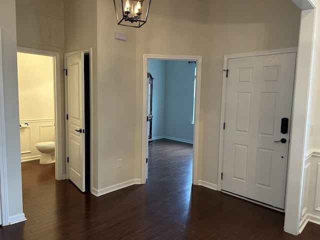 1012 Wooden Gate Dr, Franklin, TN 37064 - entrance foyer with dark wood-style floors, a chandelier, and baseboards