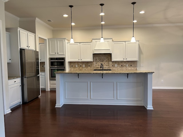 1012 Wooden Gate Dr, Franklin, TN 37064 - kitchen featuring stainless steel appliances, white cabinetry, crown molding, recessed lighting, and backsplash