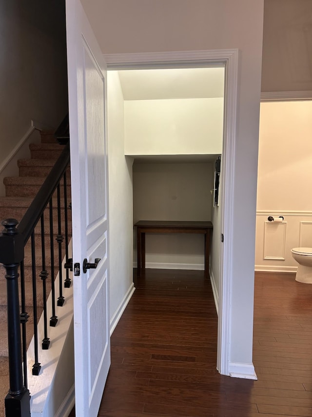 1012 Wooden Gate Dr, Franklin, TN 37064 - hallway with wood finished floors, stairs, and baseboards