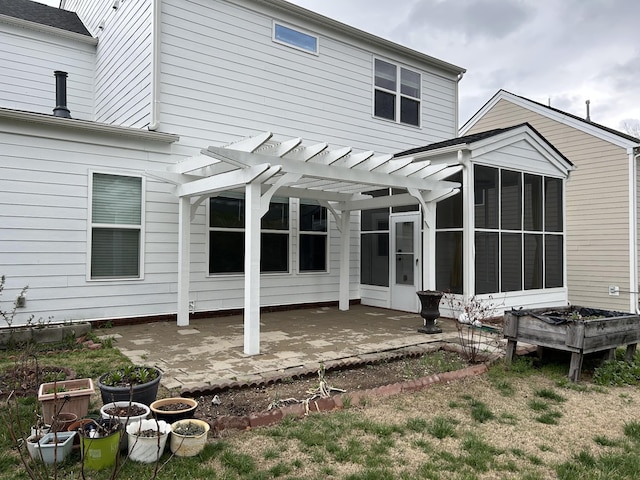 1012 Wooden Gate Dr, Franklin, TN 37064 - back of property with a sunroom, a pergola, and a patio area