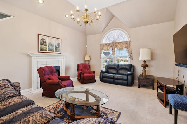 carpeted living area featuring lofted ceiling, baseboards, a tile fireplace, and a notable chandelier