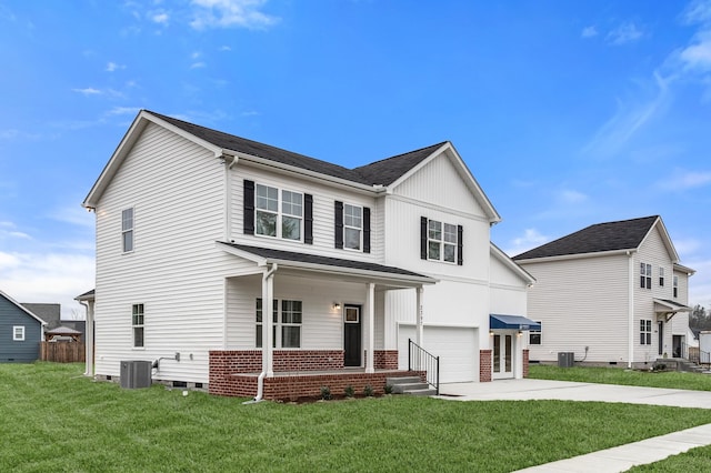 view of front of home featuring a garage, cooling unit, concrete driveway, and a front yard