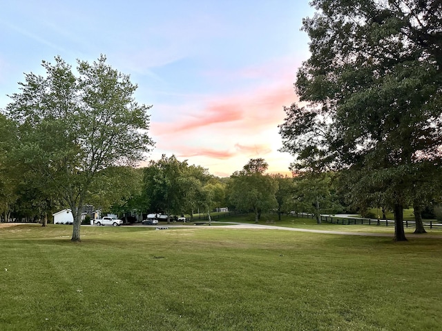 view of home's community with a lawn