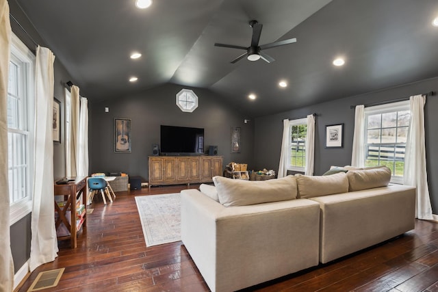 living room with visible vents, a ceiling fan, lofted ceiling, dark wood-style floors, and recessed lighting