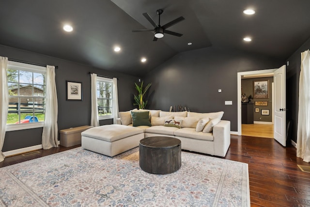 living area with baseboards, dark wood finished floors, ceiling fan, vaulted ceiling, and recessed lighting