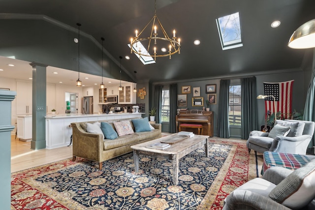 living room with decorative columns, crown molding, light wood-type flooring, high vaulted ceiling, and recessed lighting