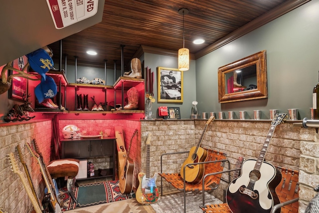 interior space featuring wood ceiling, brick wall, and ornamental molding