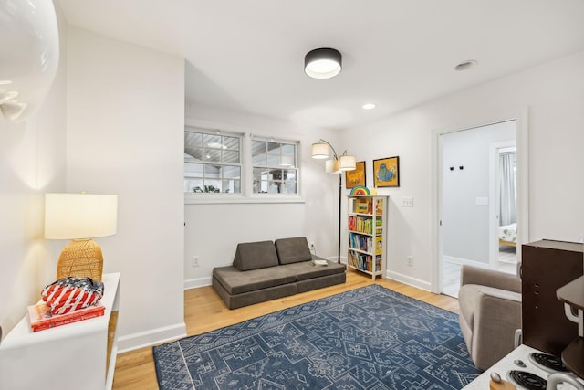 office area featuring recessed lighting, wood finished floors, and baseboards