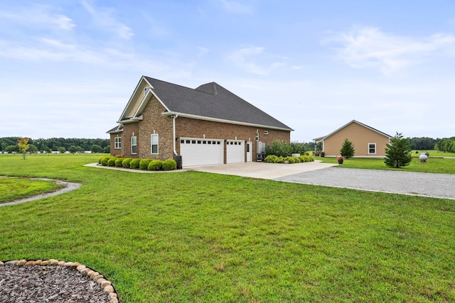 view of front of home with a garage, concrete driveway, brick siding, and a front lawn