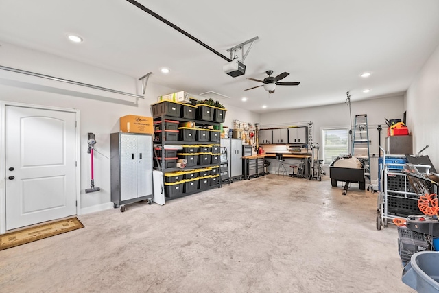 garage with ceiling fan, a workshop area, recessed lighting, and a garage door opener