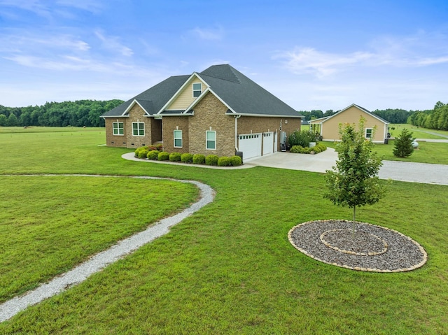 285 Hancock Ln, Tullahoma, TN 37388 - view of front facade with an attached garage, concrete driveway, a front lawn, and brick siding