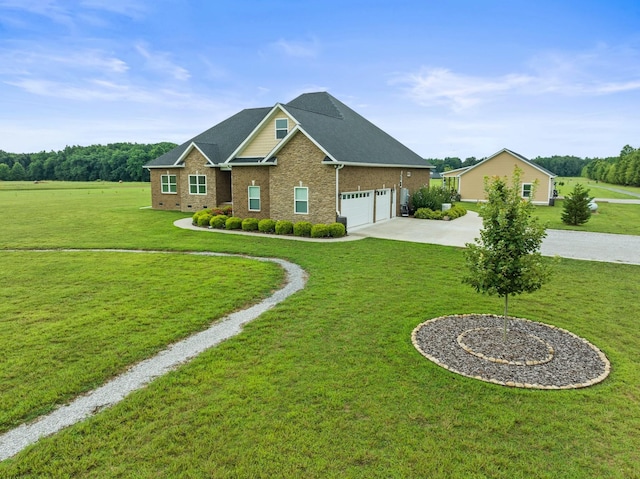 view of front of property with a garage, a front lawn, concrete driveway, and brick siding