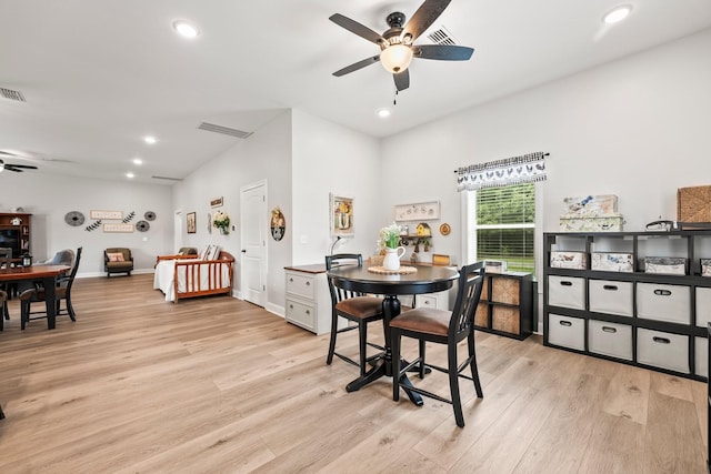 dining room with light wood finished floors, a ceiling fan, visible vents, and recessed lighting