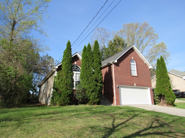 view of front facade with brick siding, an attached garage, a front lawn, and concrete driveway