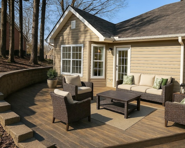 deck featuring outdoor lounge area