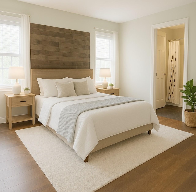 bedroom with wood finished floors