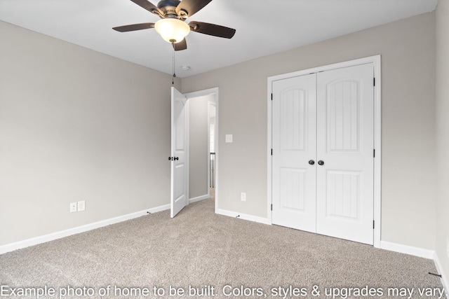 unfurnished bedroom with a ceiling fan, carpet, a closet, and baseboards