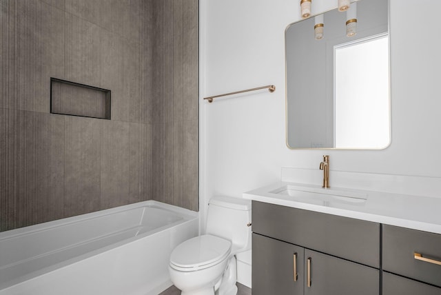 bathroom featuring shower / bathing tub combination, vanity, and toilet