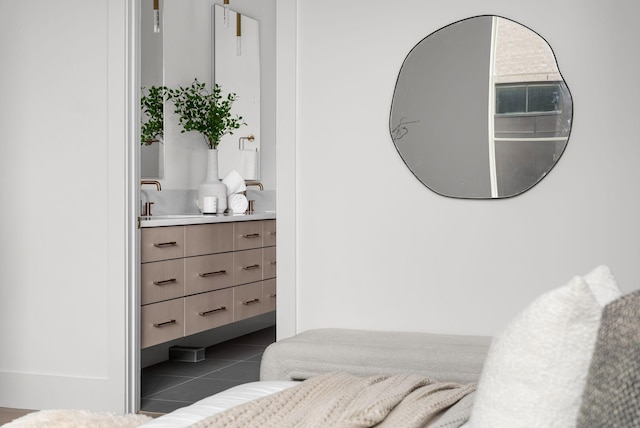 bedroom with dark tile patterned floors