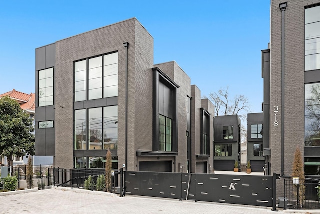 view of building exterior with fence