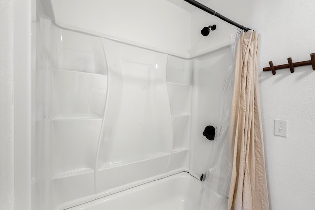 bathroom with a shower with curtain