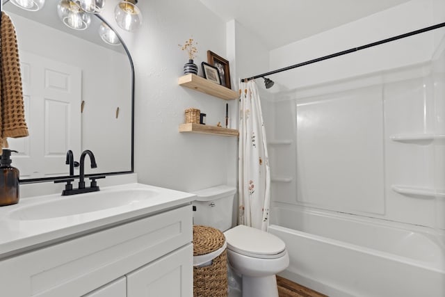 full bath featuring shower / tub combo, vanity, and toilet