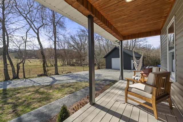 deck featuring an outdoor structure