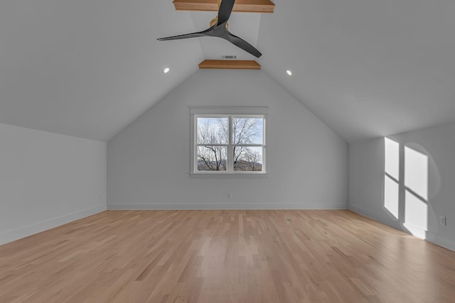 bonus room with visible vents, light wood-style flooring, vaulted ceiling, ceiling fan, and baseboards