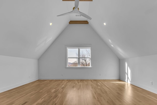 bonus room with light wood-type flooring, baseboards, visible vents, and vaulted ceiling