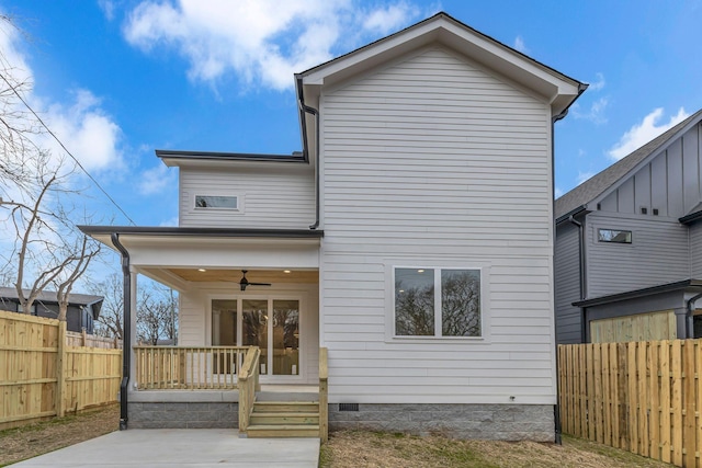 rear view of property featuring crawl space, fence private yard, ceiling fan, and a patio