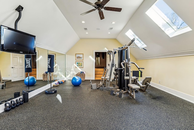 exercise room featuring lofted ceiling, visible vents, and baseboards