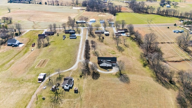 birds eye view of property featuring a rural view