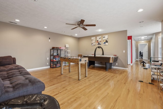 rec room featuring light wood-style flooring, baseboards, and recessed lighting