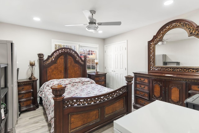 bedroom featuring ceiling fan, light wood-style floors, a closet, and recessed lighting