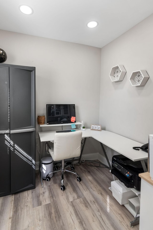 office area with recessed lighting, baseboards, and wood finished floors