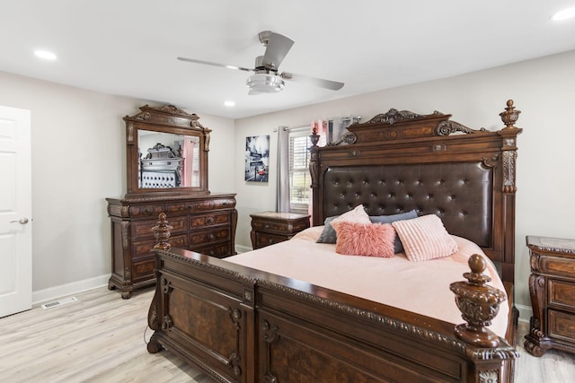 bedroom featuring recessed lighting, visible vents, a ceiling fan, baseboards, and light wood-type flooring